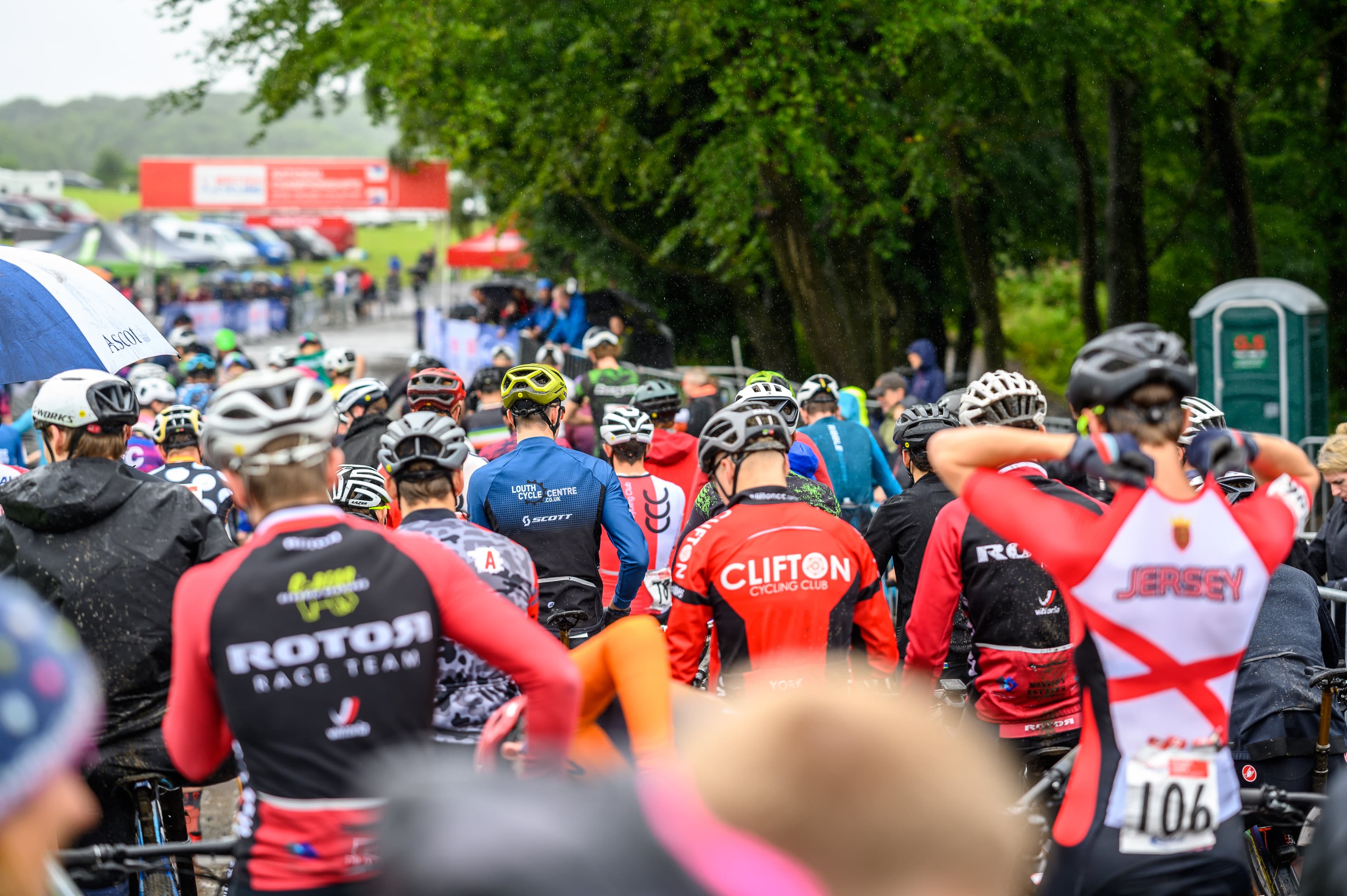 Riders lining up at the start of a cross country mountain bike race